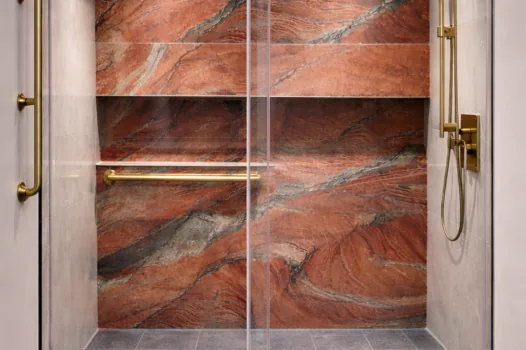 Bold rust-marble curbless walk-in shower with grab bar Ottawa